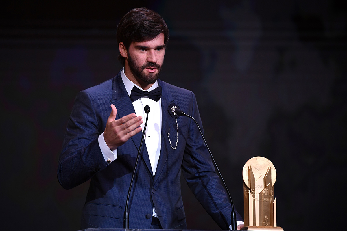 Alisson receives prize after Messi