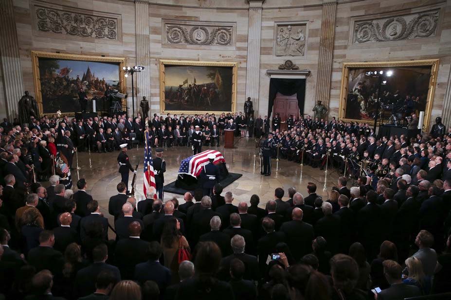 Body of George HW Bush lies in state in US Capitol