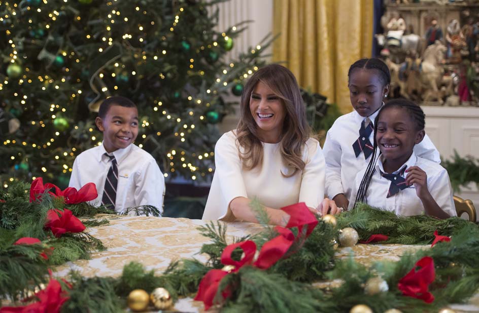 Melania Trump hosts military families to see White House Christmas decorations