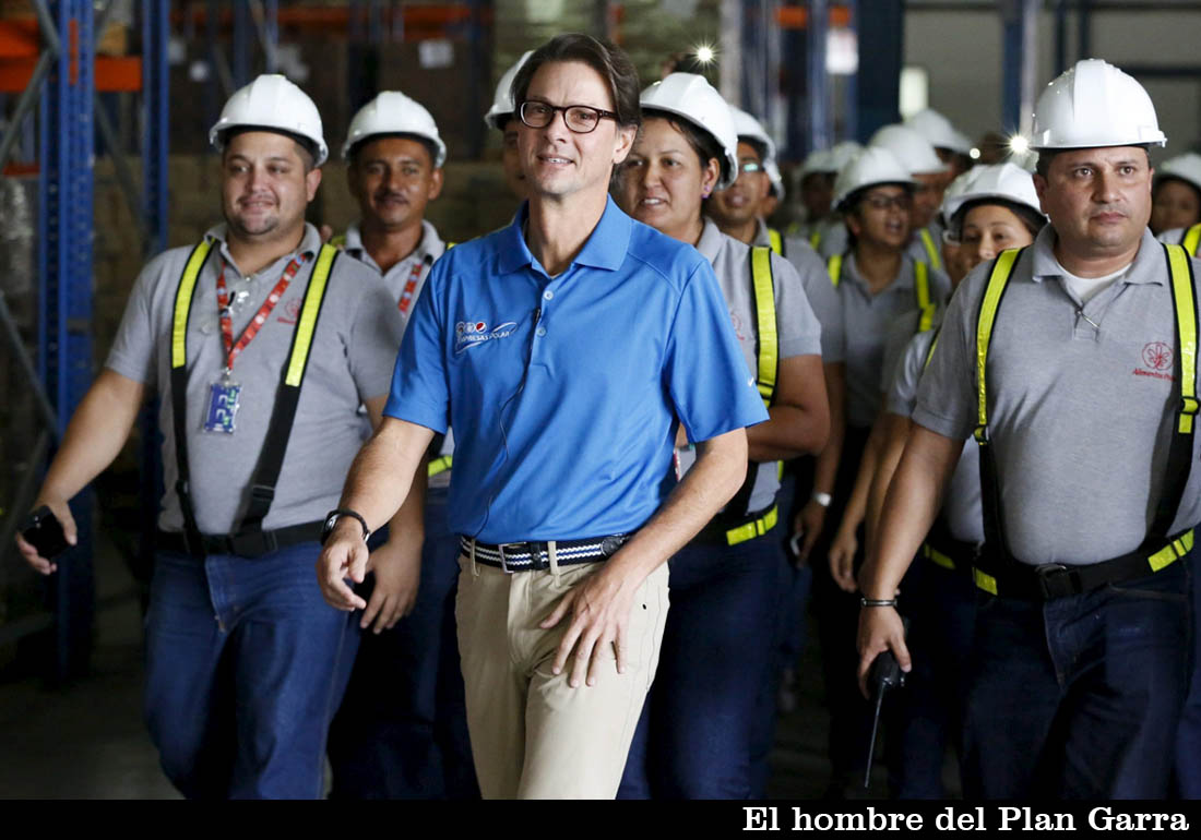 Mendoza, president of Venezuela's largest private food production company Empresas Polar, arrives to a news conference at a distribution center of the company in Maracay