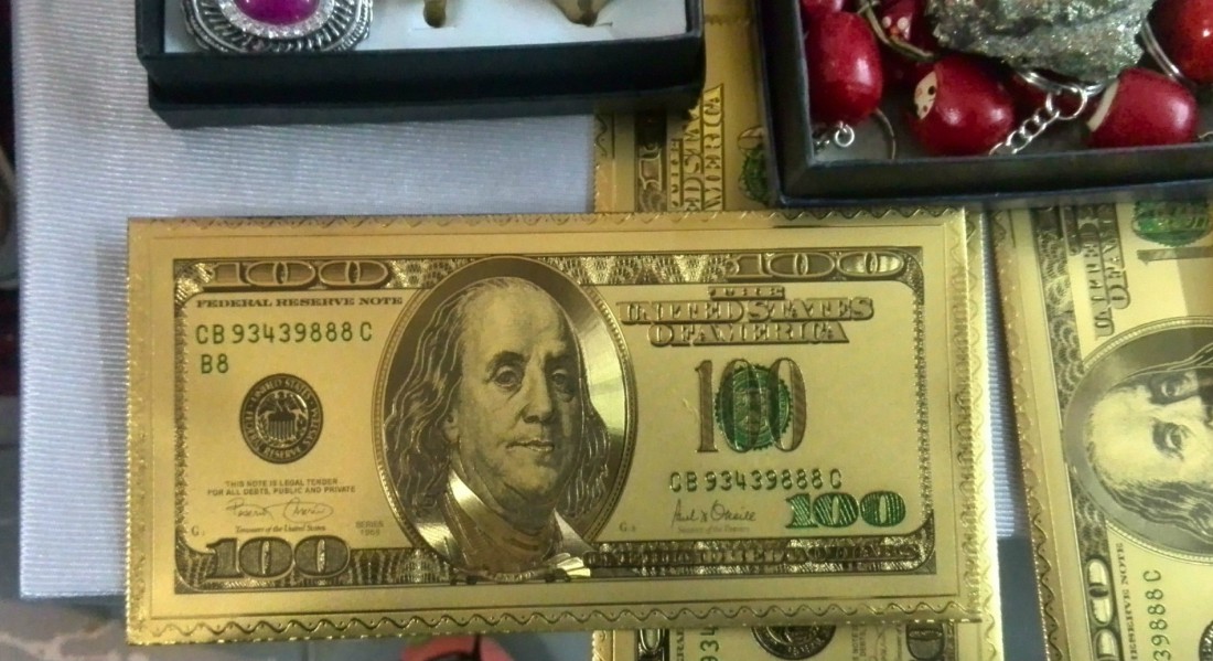 Sobre de dolar dorado