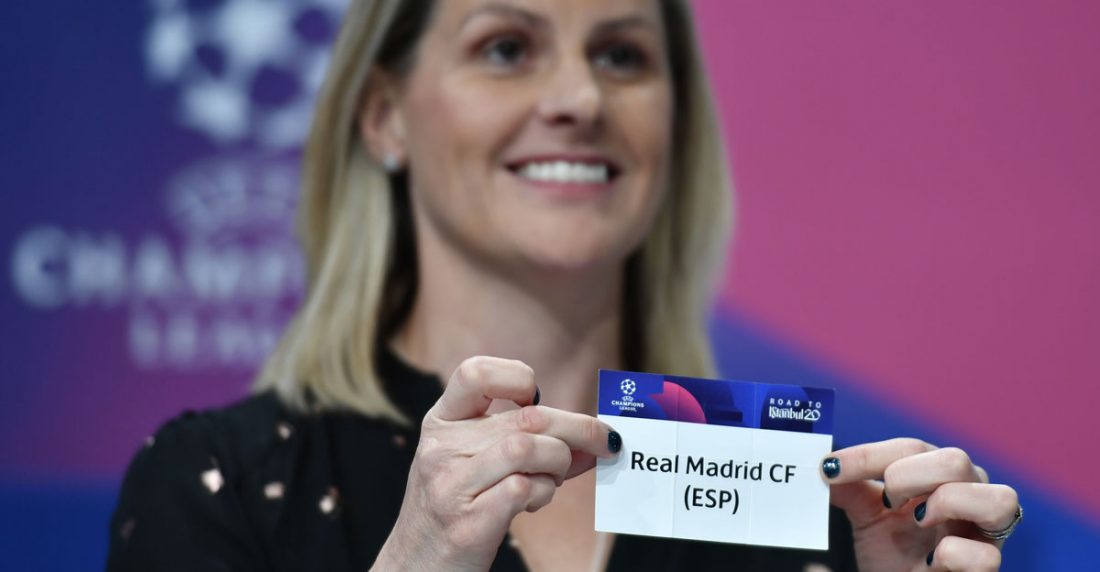 UEFA Champions League ambassador Kelly Smith holds the slip of Real Madrid during the UEFA Champions League football cup round of 16 draw ceremony on December 16, 2019 in Nyon.